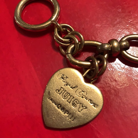 JUICY COUTURE 3 CHARM BRACELET. ONE NOT REMOVABLE